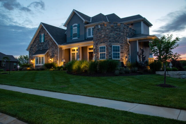 A well lit and maintained landscape